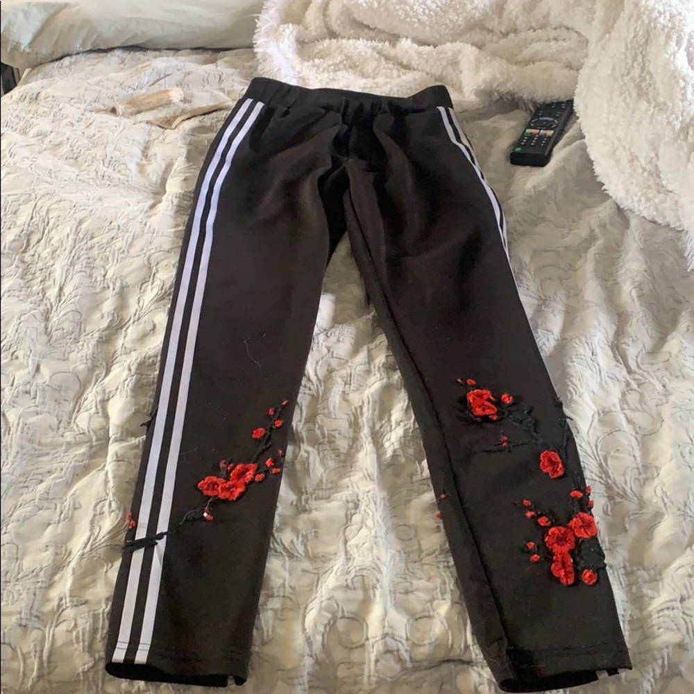 White striped bottoms with floral embroidery